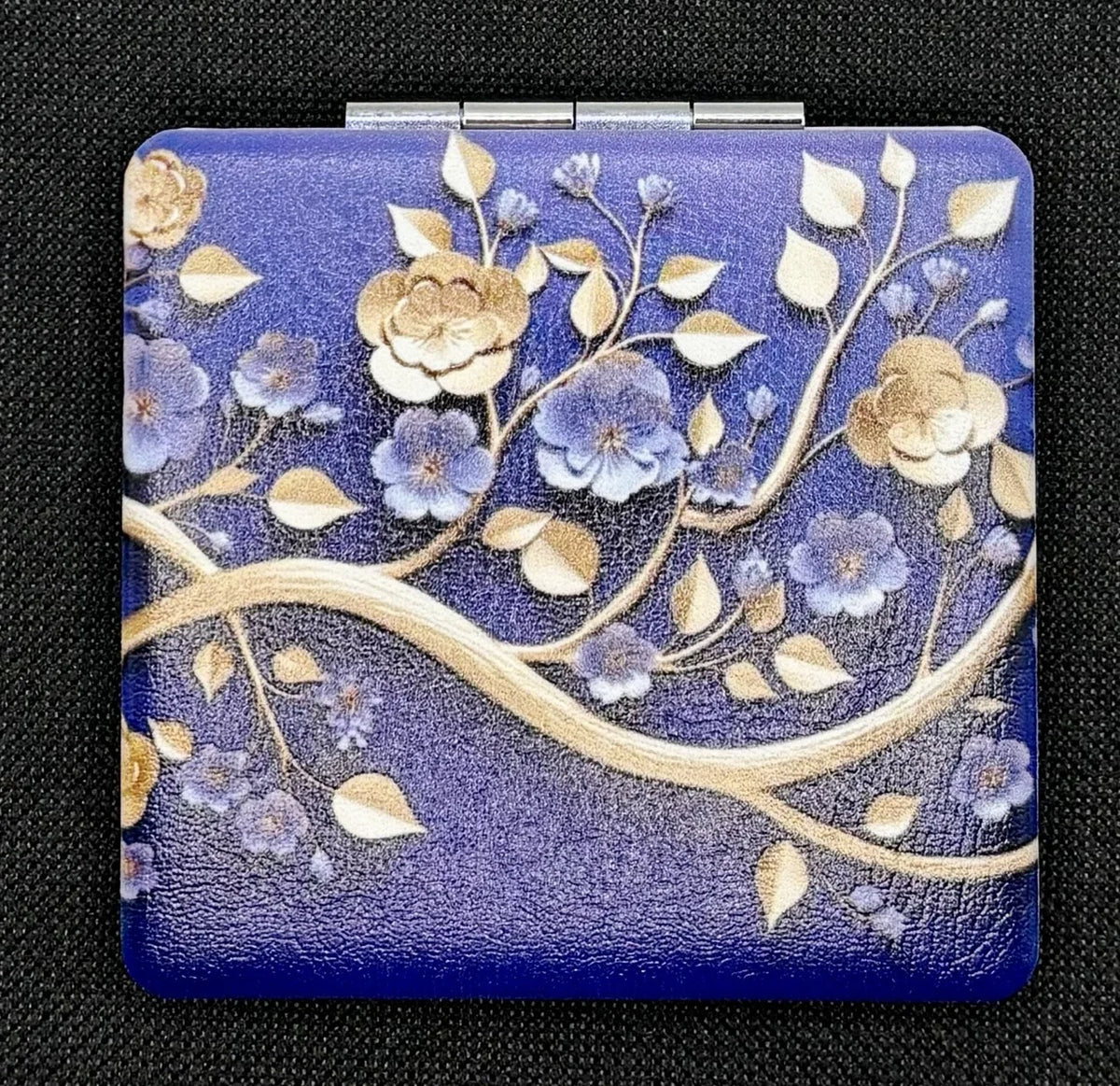 Closed Blue and Gold Flowers On Blue bead case on dark fabric
