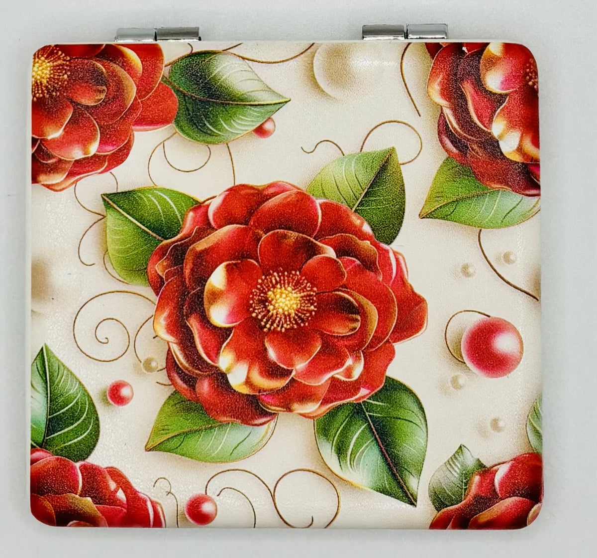 Closed Red Camellia Flower bead case with large red camellias and green leaves on a cream background