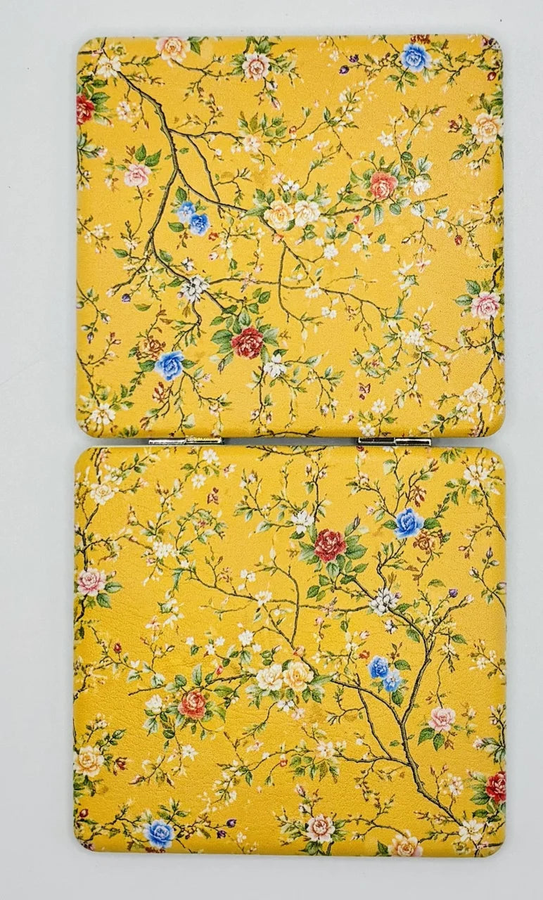 Both decorated exterior sides of the Flower Vines on Yellow Background bead case