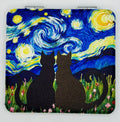 Closed bead case showing two cats beneath a swirly blue and gold sky