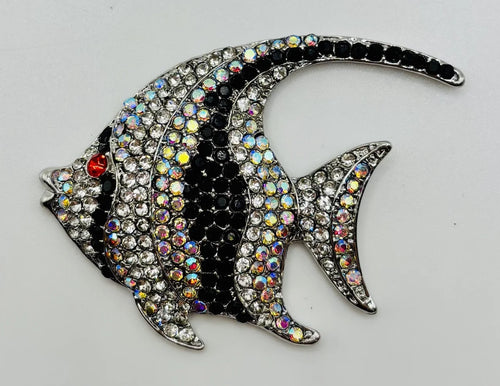 Black and white crystal angelfish needle minder on a white background
