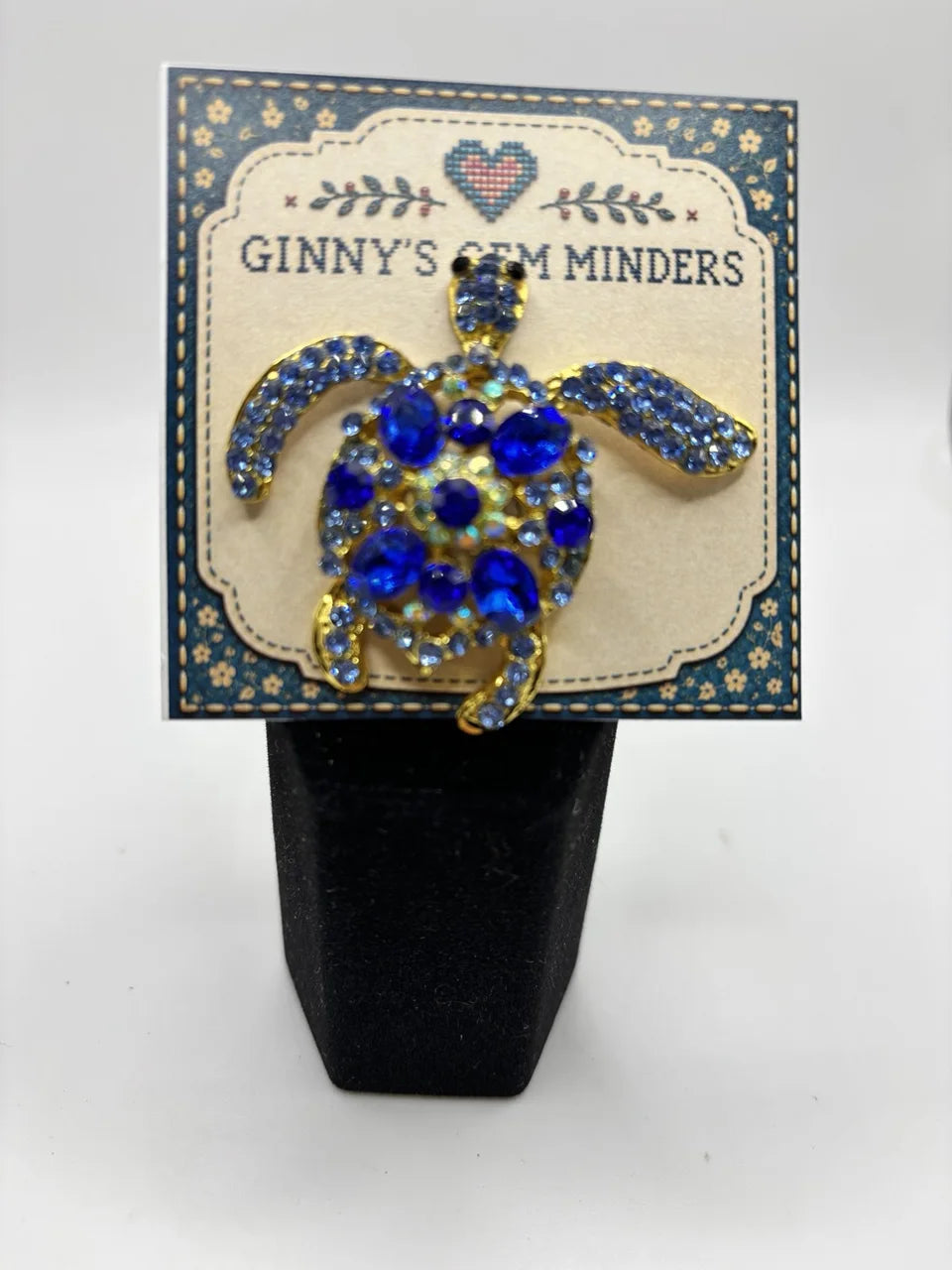 Blue sea turtle needle minder on Ginny’s Gem Minders display card