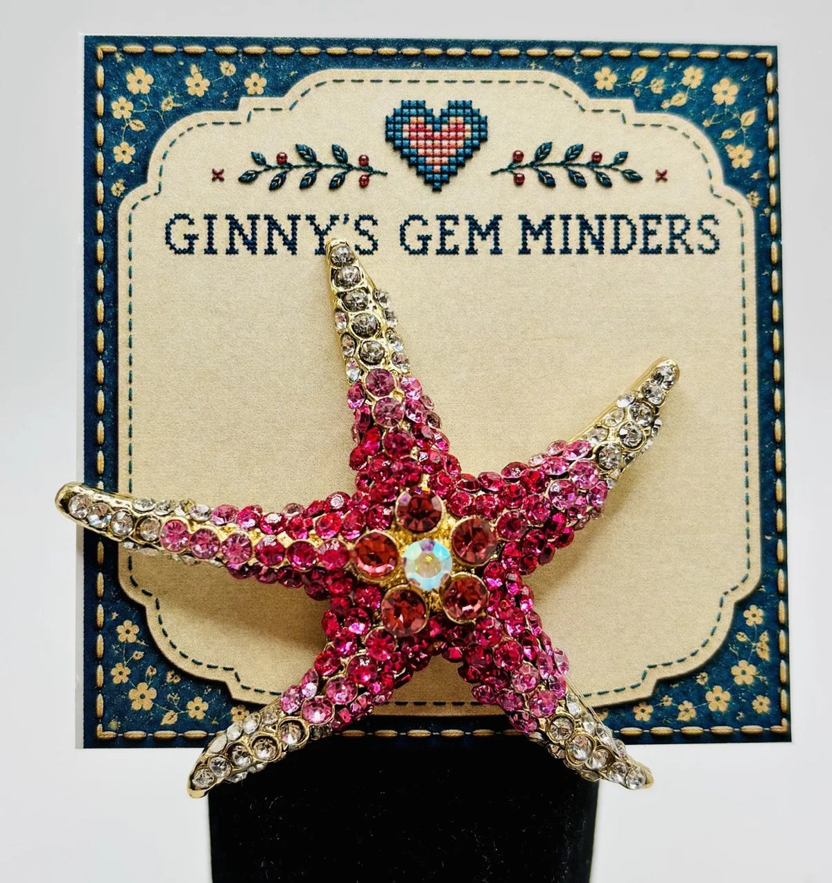 Pink crystal starfish needle minder on Ginny’s Gem Minders display card