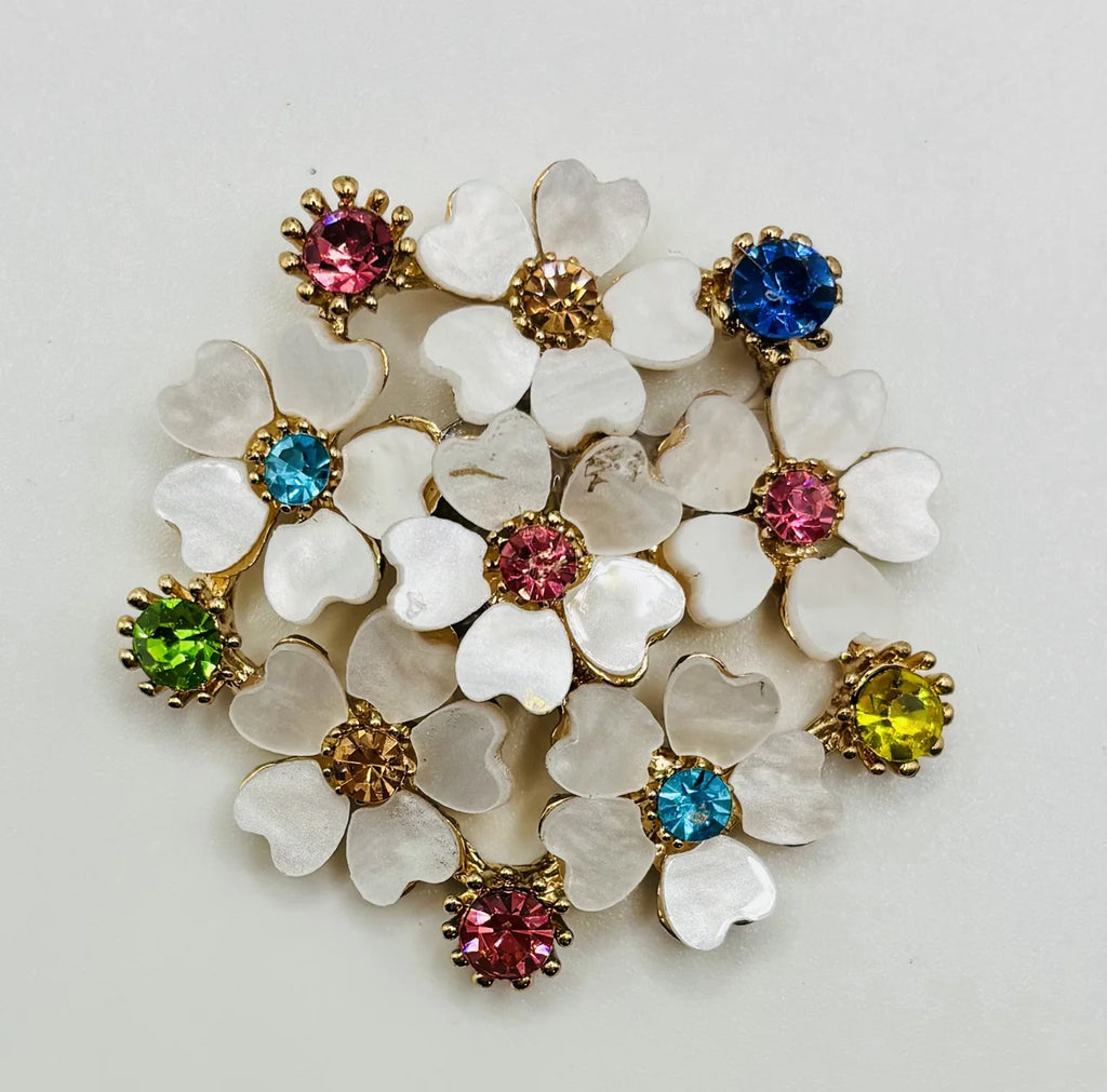 Crystal white posey needle minder on a white background
