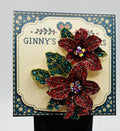 Crystal red poinsettia needle minder on Ginny’s Gem Minders display card