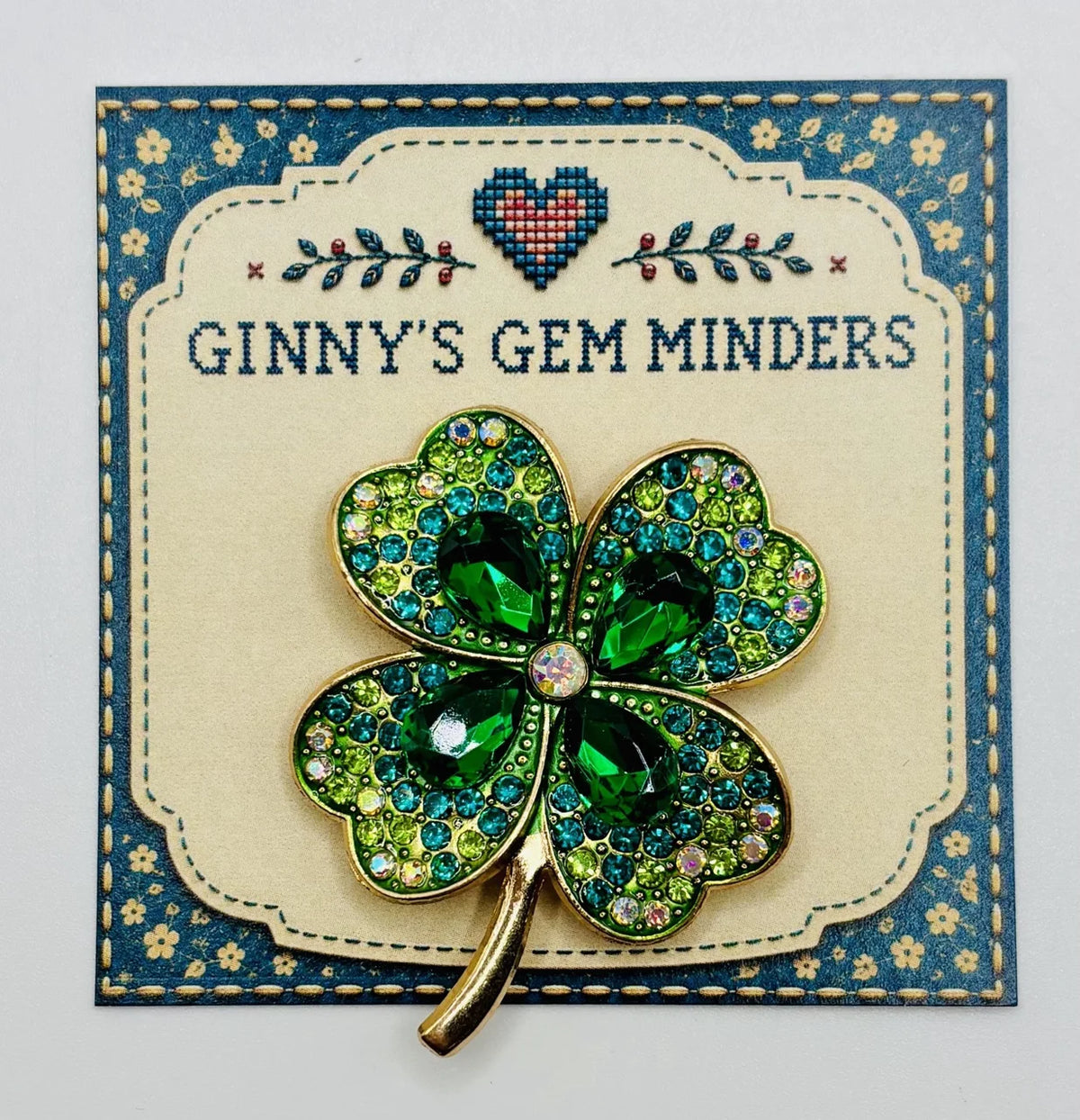 Large crystal shamrock needle minder on Ginny’s Gem Minders display card