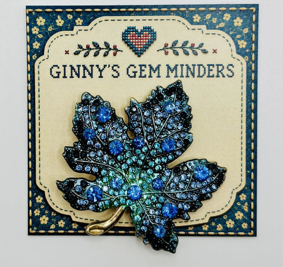 Blue crystal leaf needle minder on Ginny’s Gem Minders display card