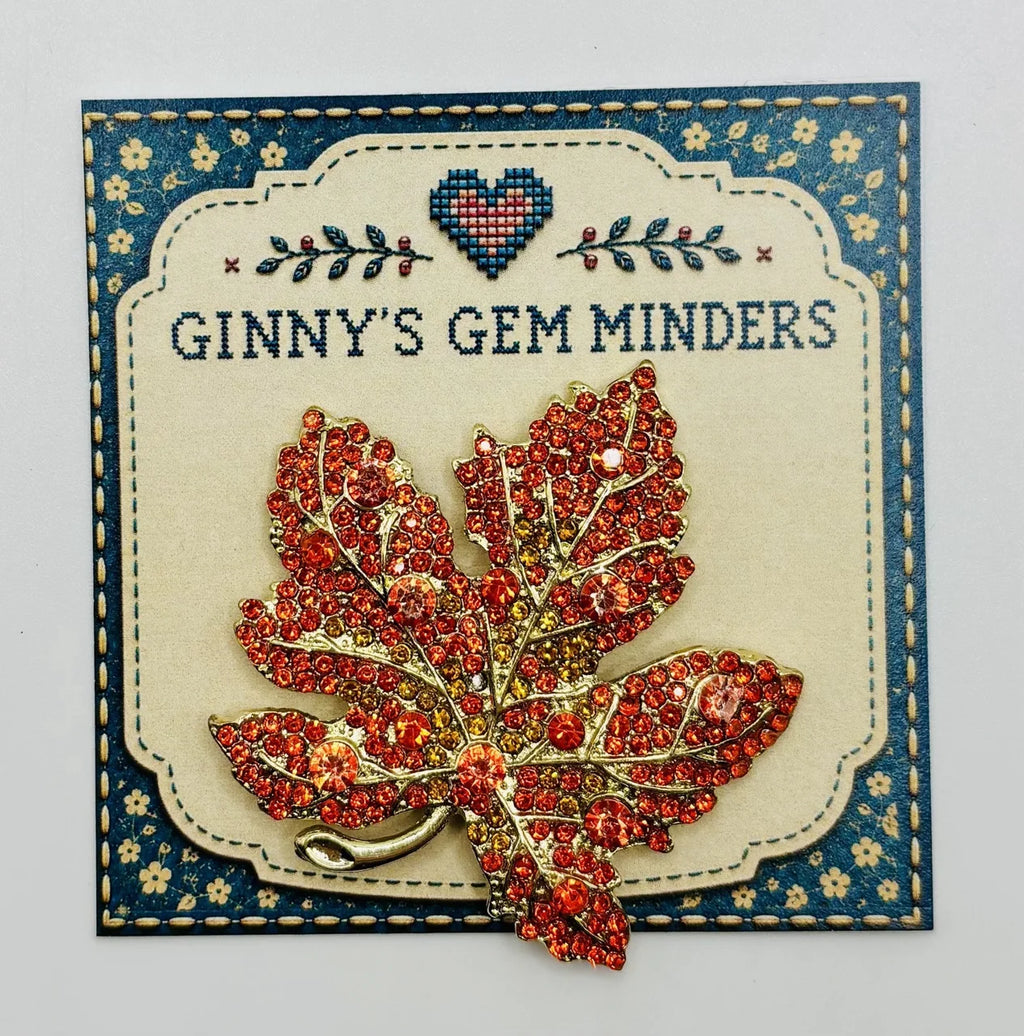Orange crystal leaf needle minder on Ginny’s Gem Minders display card
