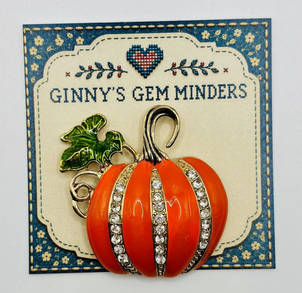 Large enamel pumpkin with crystals needle minder on Ginny’s Gem Minders display card