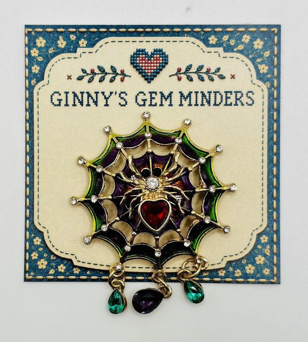 Jeweled spider in web needle minder on Ginny’s Gem Minders display card
