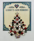 Crystal encrusted tree needle minder on Ginny’s Gem Minders display card