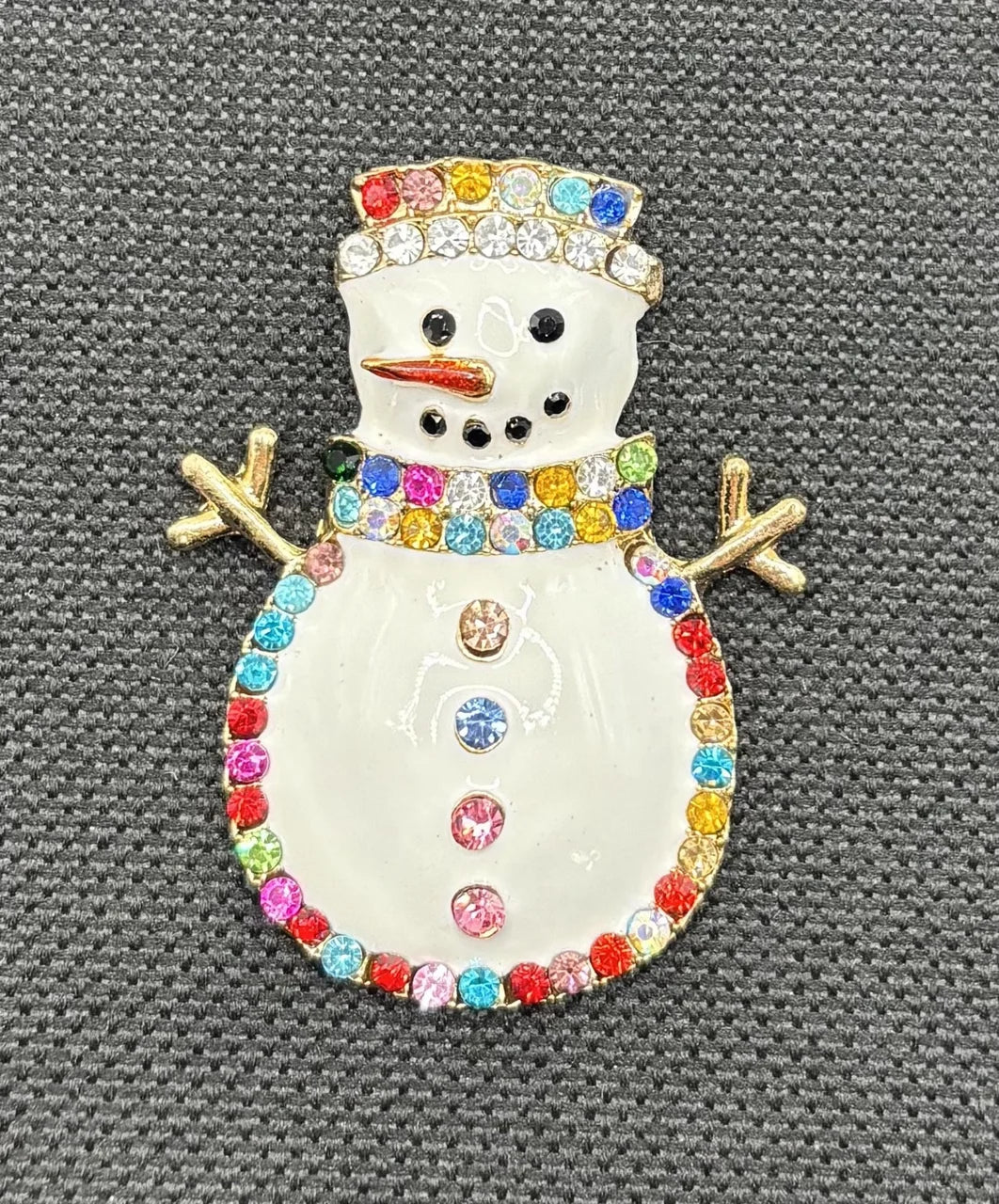 Snowman needle minder on dark fabric