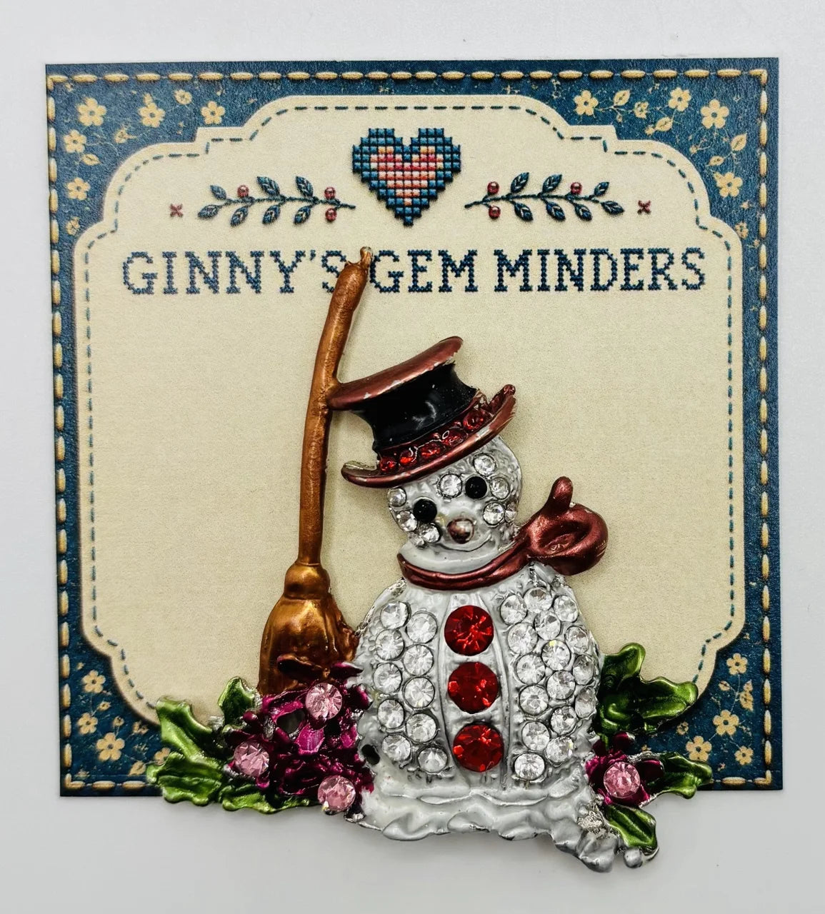 Snowman with broom needle minder on Ginny’s Gem Minders display card