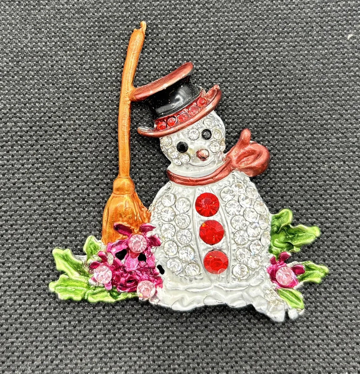 Snowman with broom needle minder on dark fabric