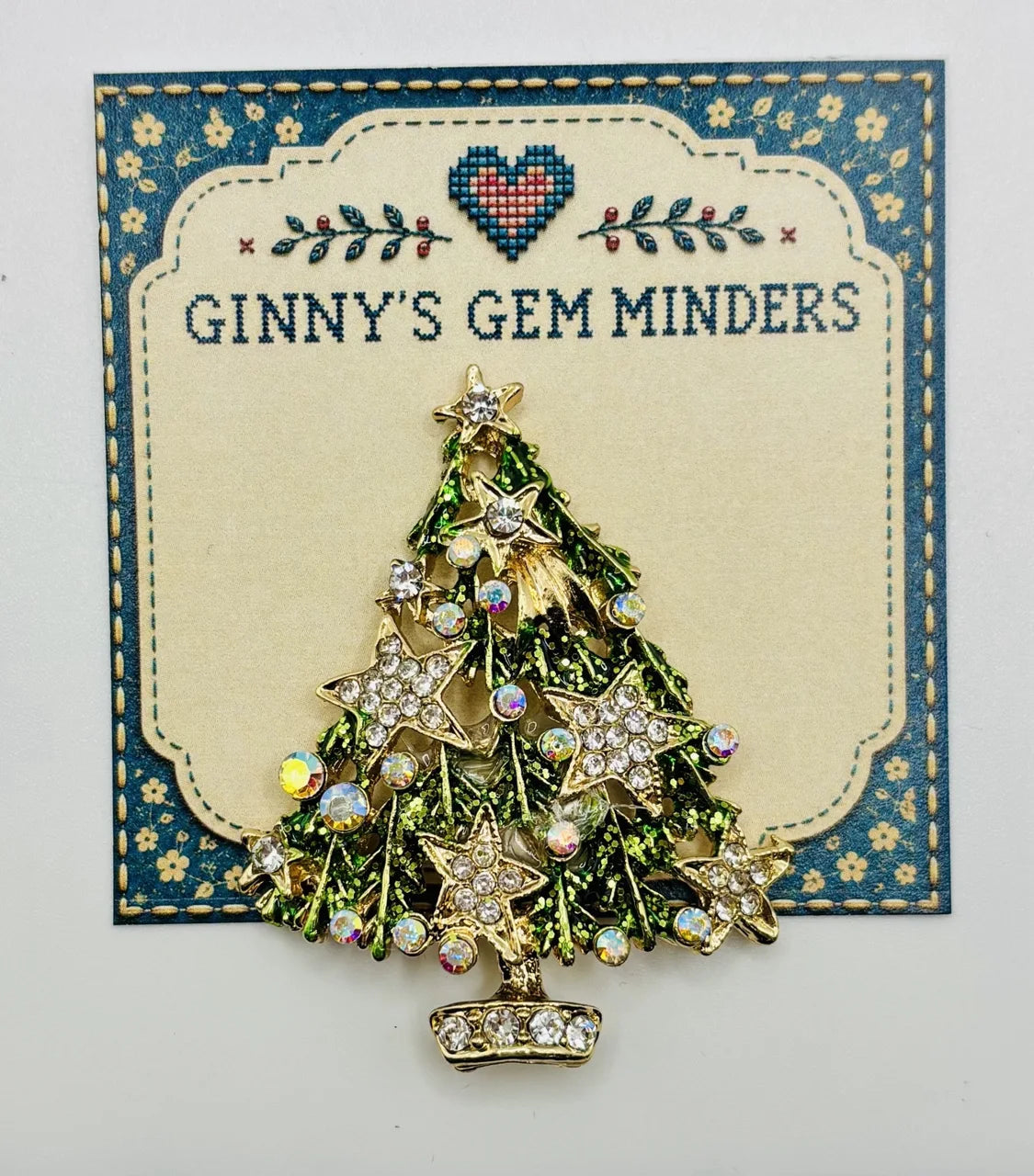 Green tree with crystal stars needle minder on Ginny’s Gem Minders display card