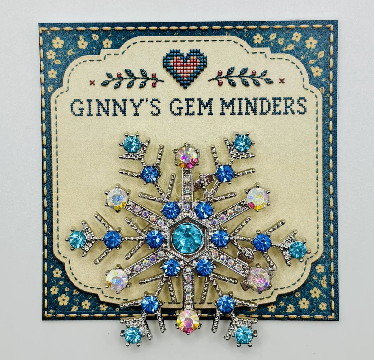 Blue crystal snowflake needle minder on Ginny’s Gem Minders display card
