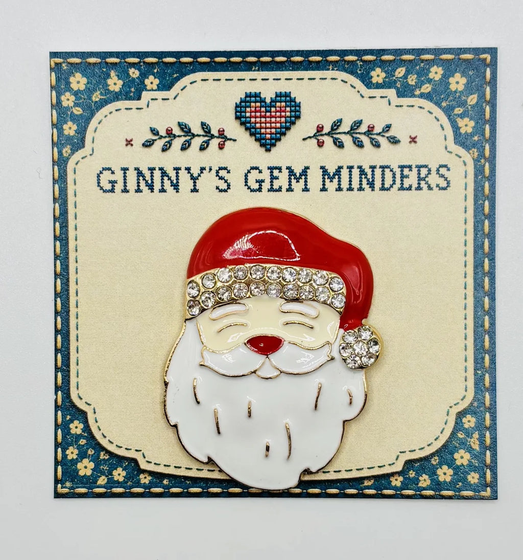 Enamel Santa face needle minder on Ginny’s Gem Minders display card