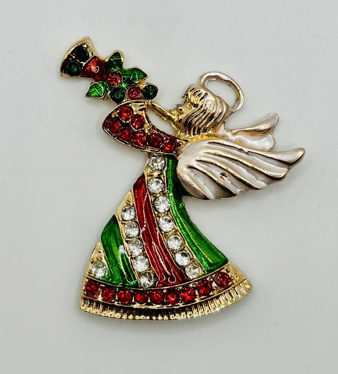 Crystal angel needle minder on a white background