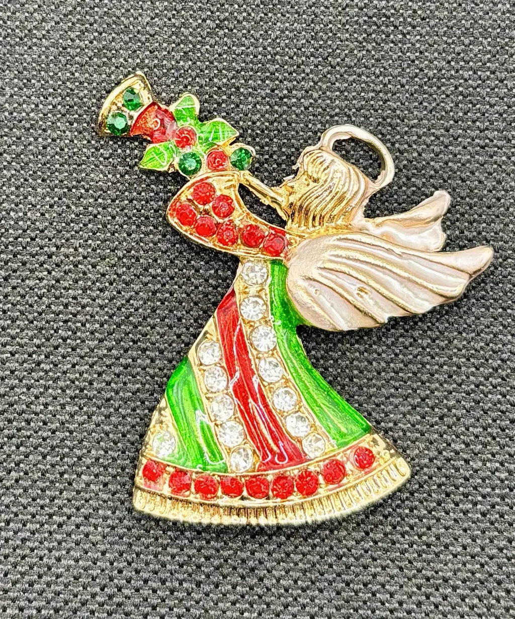 Crystal angel needle minder on dark fabric