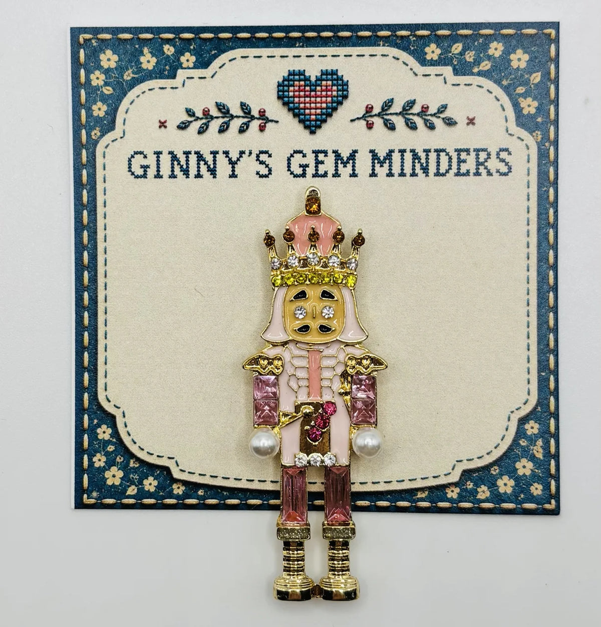 Pink crystal nutcracker needle minder on Ginny’s Gem Minders display card