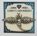 Silver and crystal dragonfly needle minder on Ginny’s Gem Minders display card