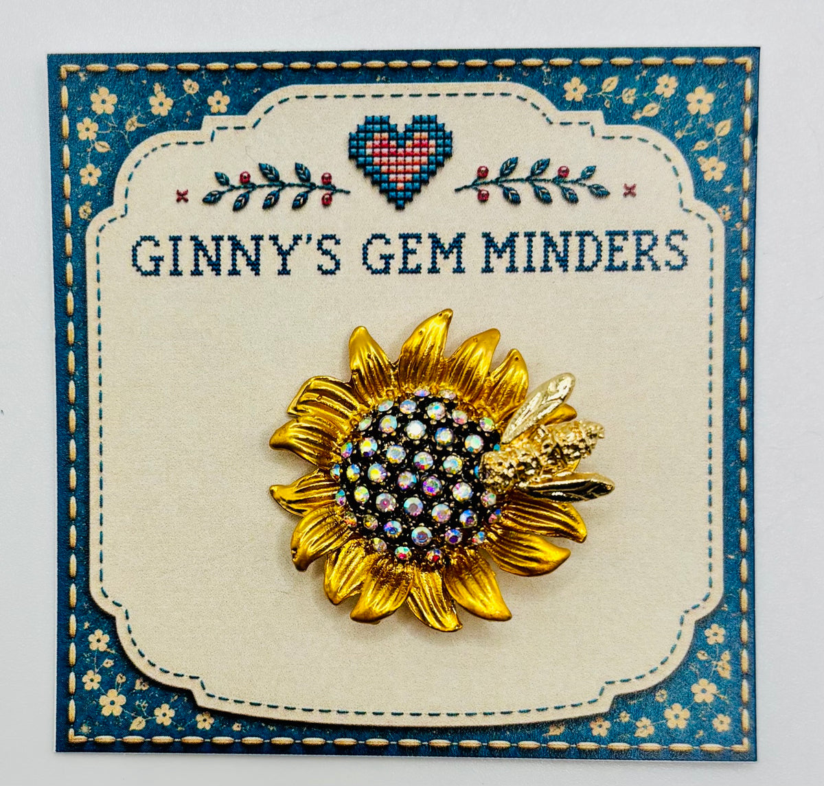 Crystal sunflower with bee needle minder on Ginny’s Gem Minders display card
