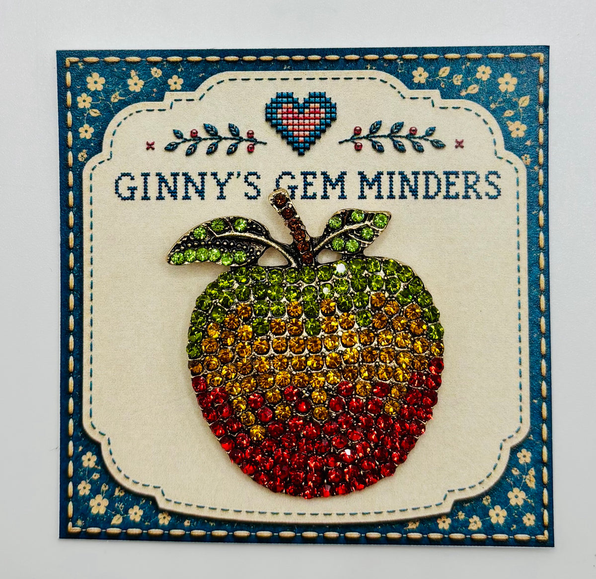Crystal apple needle minder on Ginny’s Gem Minders display card
