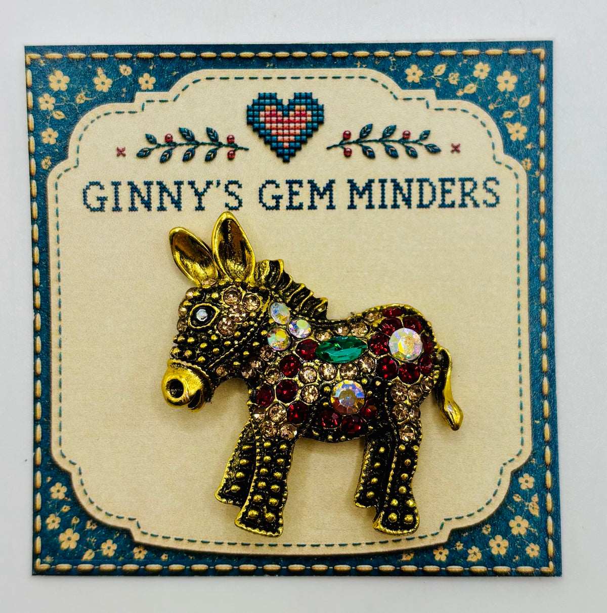 Colorful Crystal and Gold Donkey Needle Minder on display card