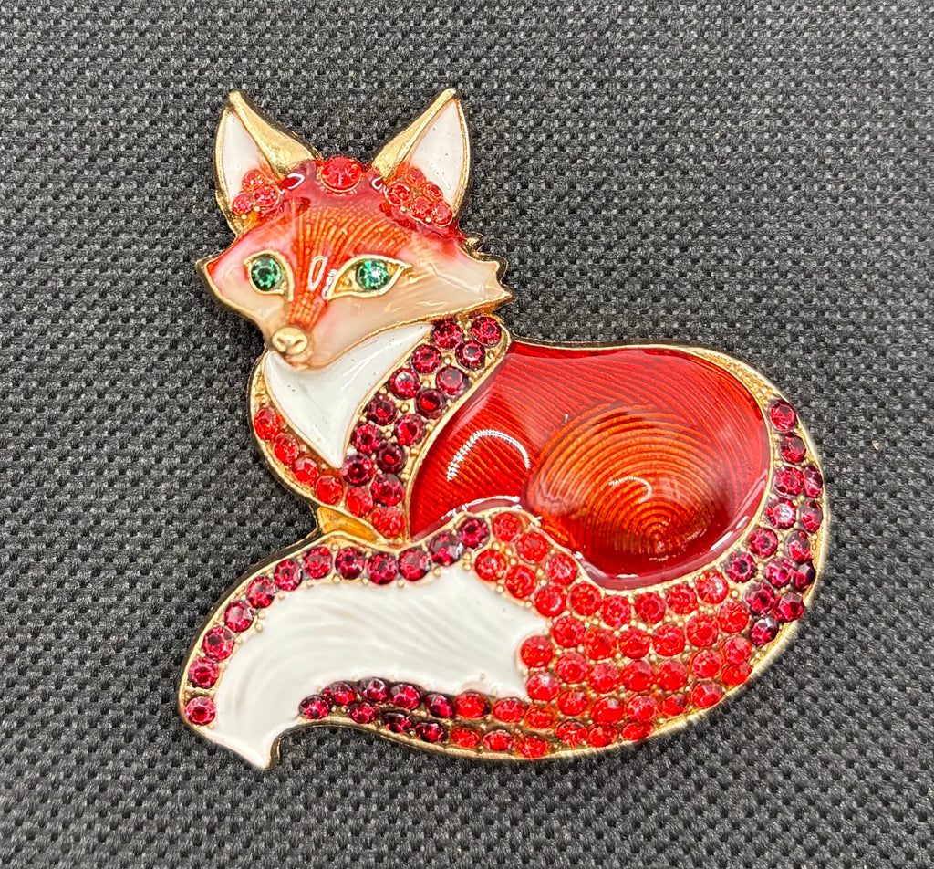 Stunning Enamel Crystal Fox Needle Minder on dark fabric