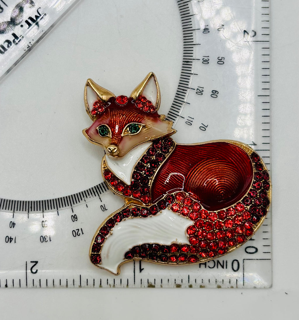 Stunning Enamel Crystal Fox Needle Minder beside ruler for scale