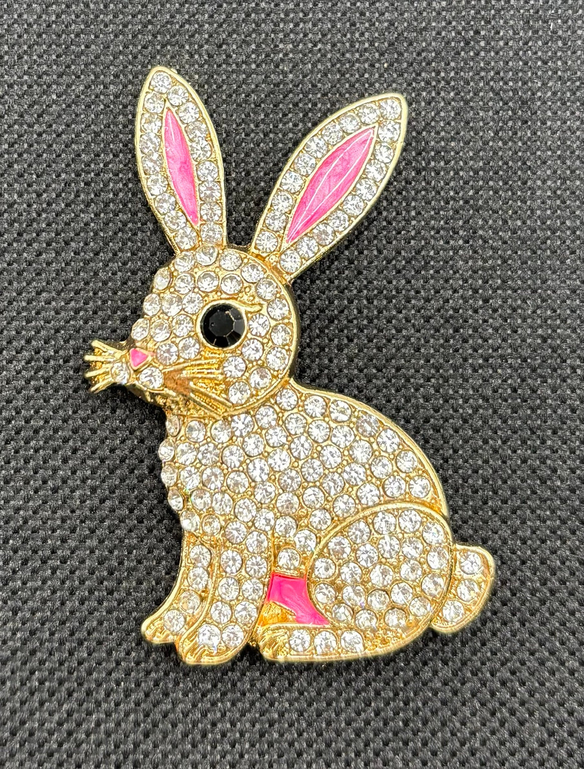 Gorgeous Crystal Bunny Rabbit Needle Minder on dark fabric