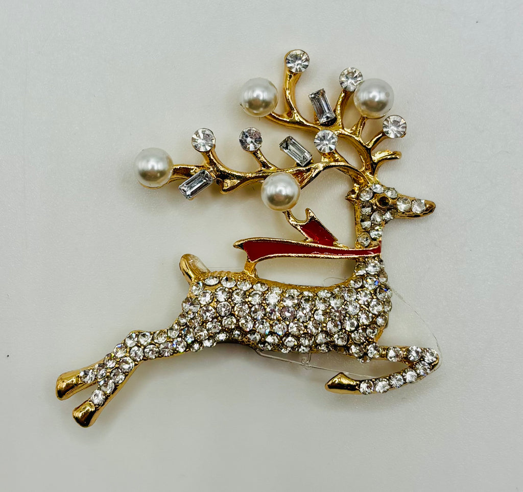 Lovely Crystal and Pearl Reindeer Needle Minder on white background