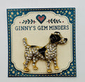 Black and crystal spotted dog needle minder on display card