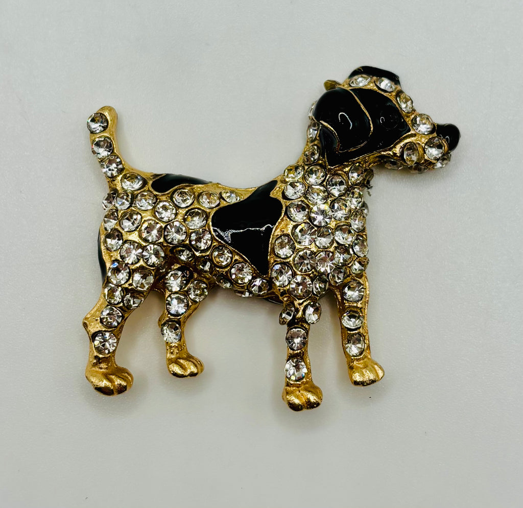 Black and crystal spotted dog needle minder on white background