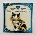 Black and white cat kitty needle minder on display card