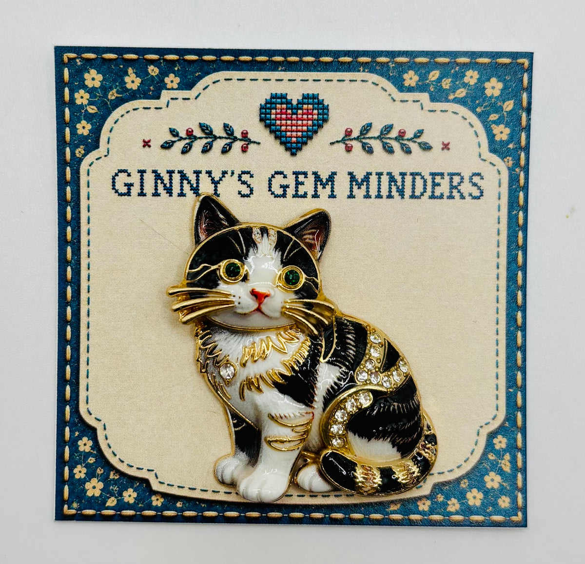 Black and white cat kitty needle minder on display card