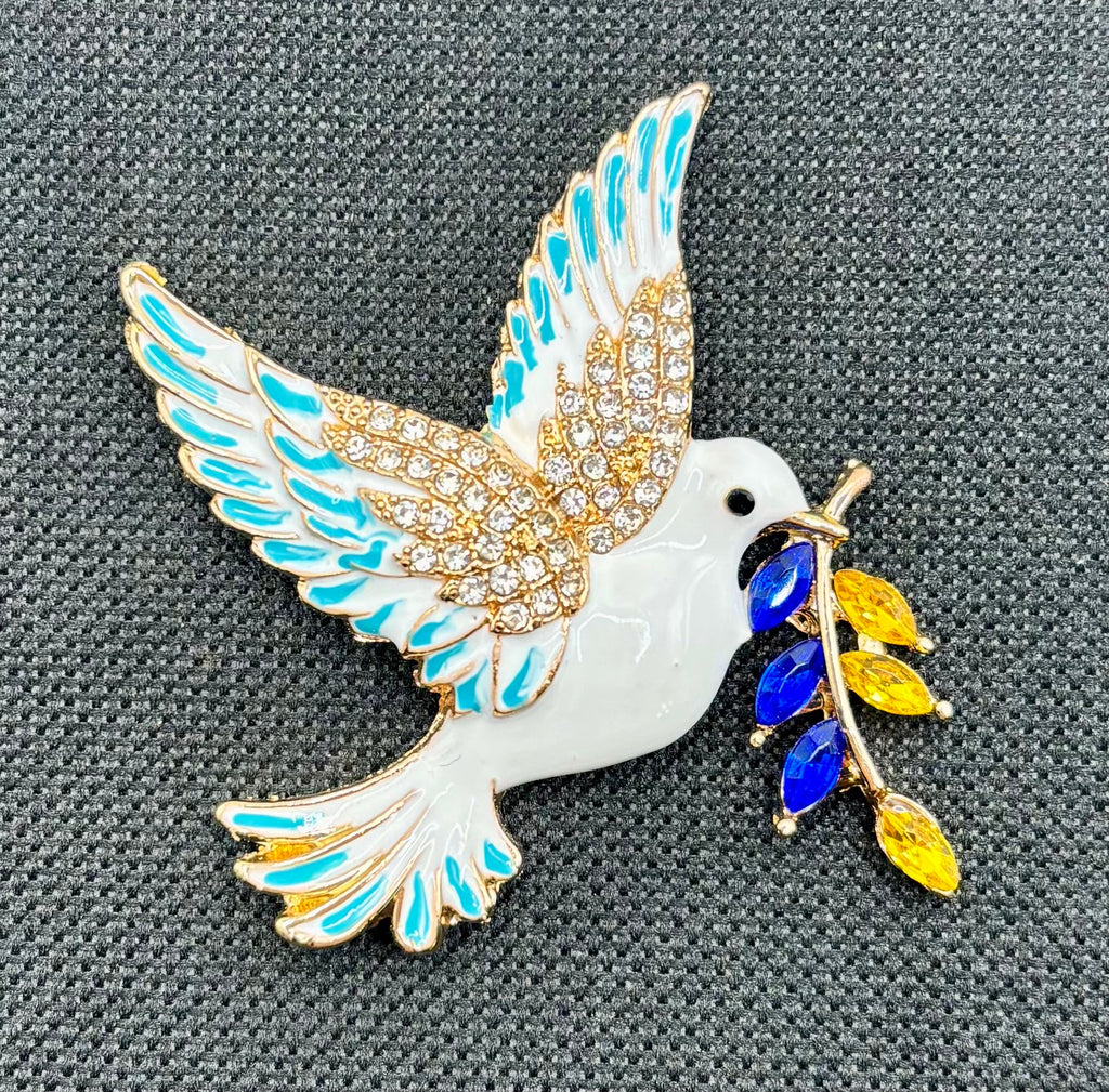 Blue-branch enamel dove needle minder — dark fabric