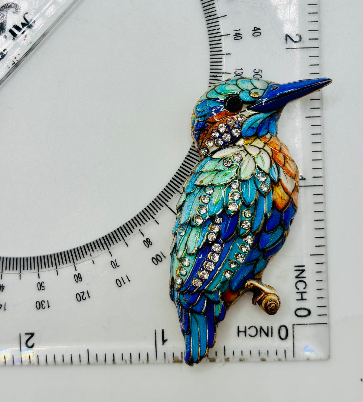 Blue enamel and crystal kingfisher needle minder — ruler scale