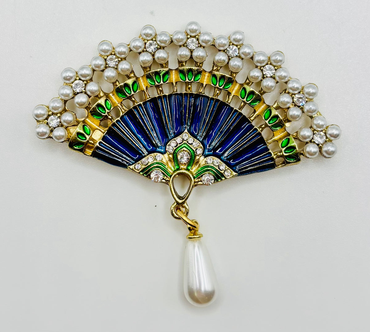 Stunning Blue Green Pearl Flowers Fan Needle Minder — white background