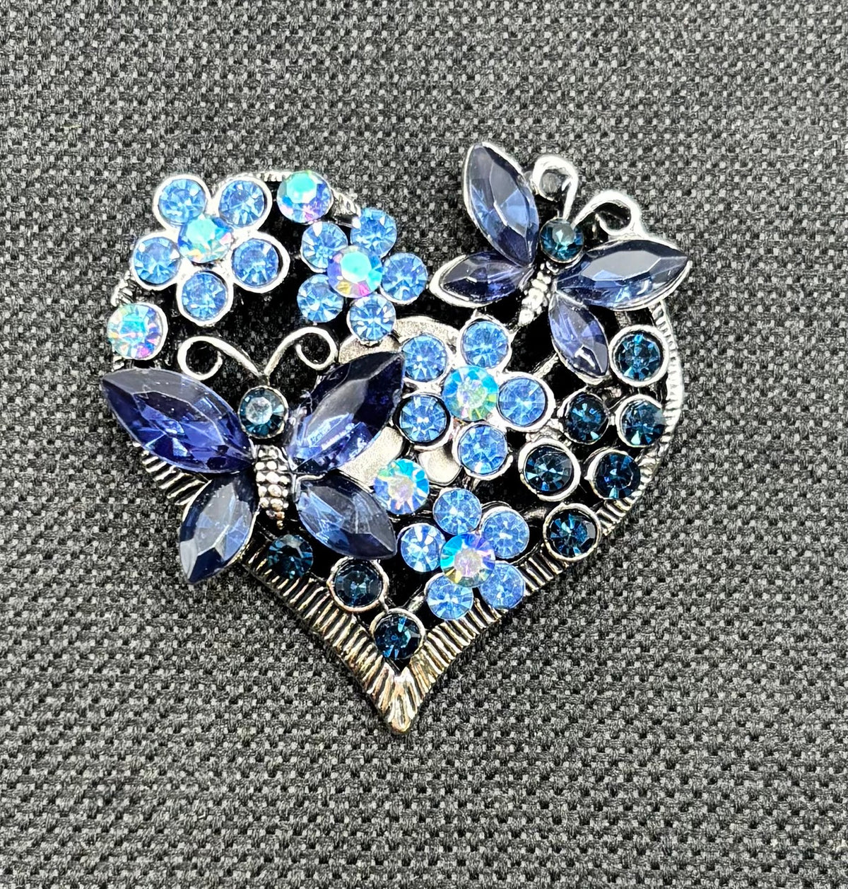 Sweet Crystal Blue Heart and Butterflies Needle Minder — dark fabric