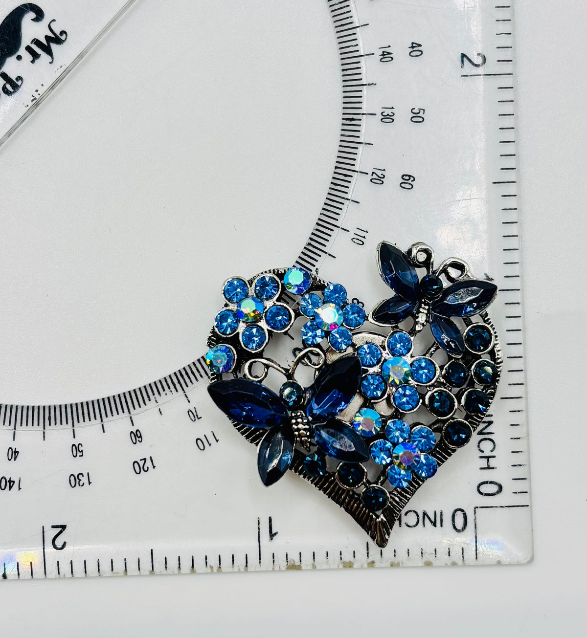Sweet Crystal Blue Heart and Butterflies Needle Minder — ruler