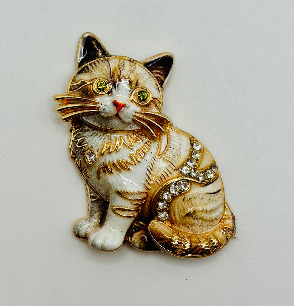 Cream tabby cat kitty needle minder on white background