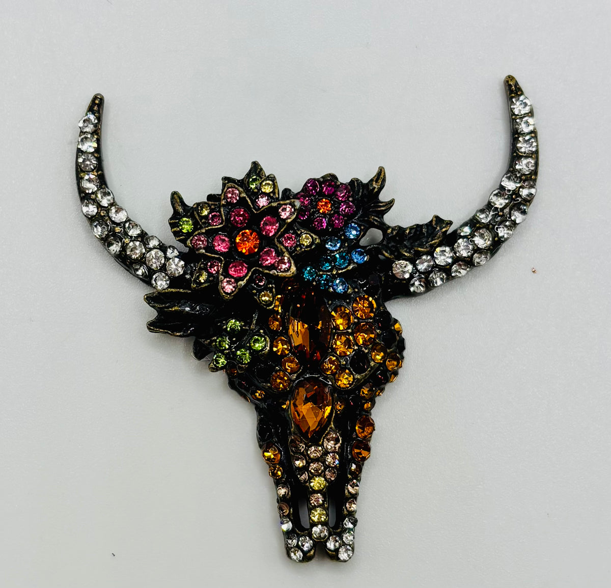 Stunning Crystal Cow Skull Needle Minder — white background