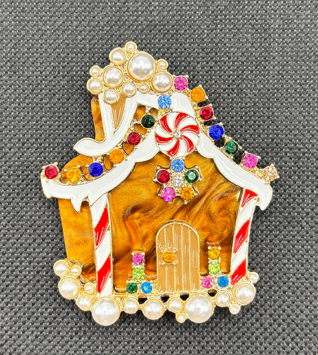 Stunning Crystal Gingerbread House Needle Minder on dark fabric