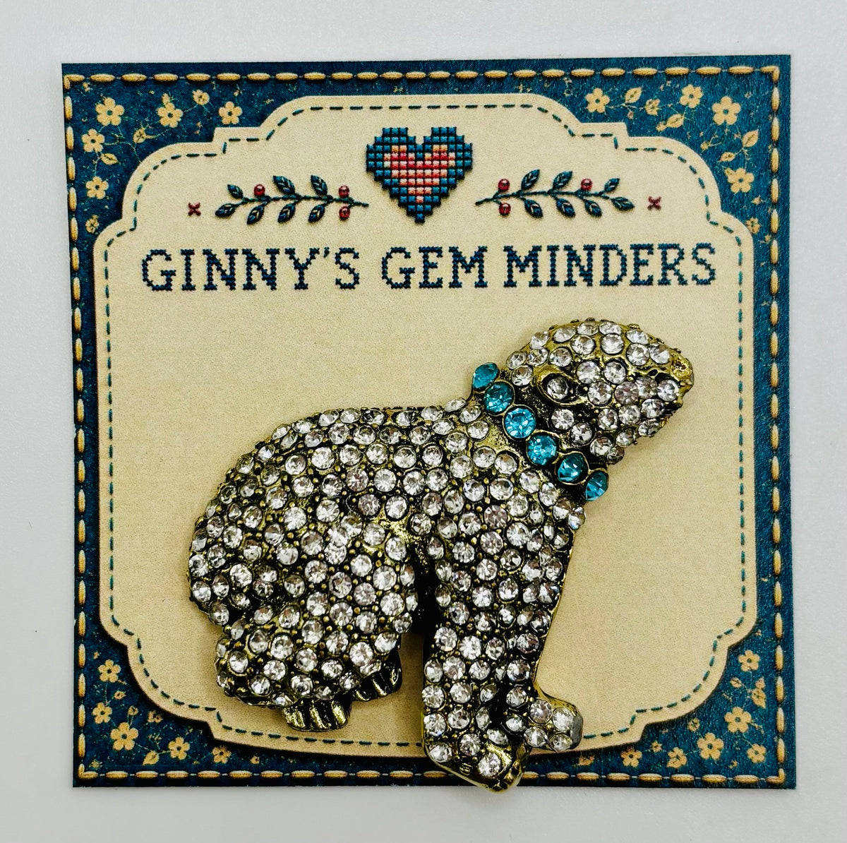 Crystal polar bear needle minder on display card