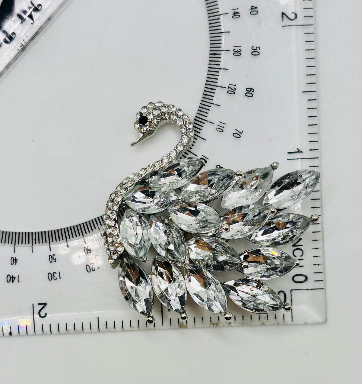 Crystal swan needle minder — ruler scale