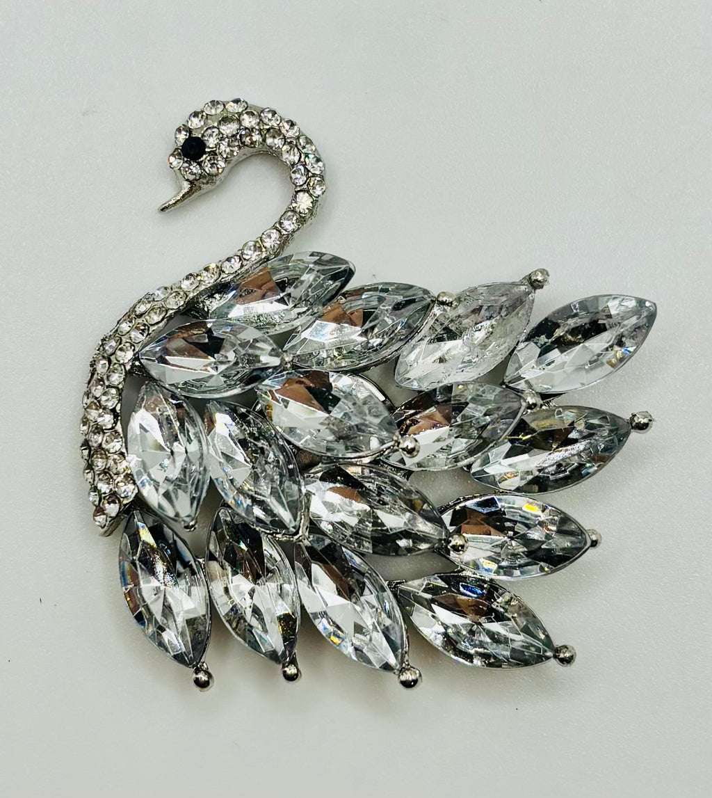 Crystal swan needle minder — white background