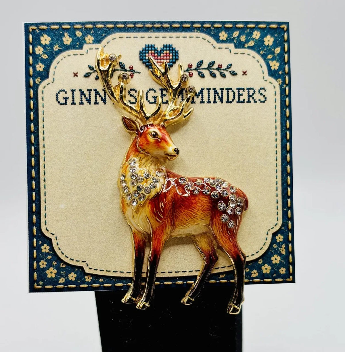 Jeweled deer needle minder on Ginny’s Gem Minders display card