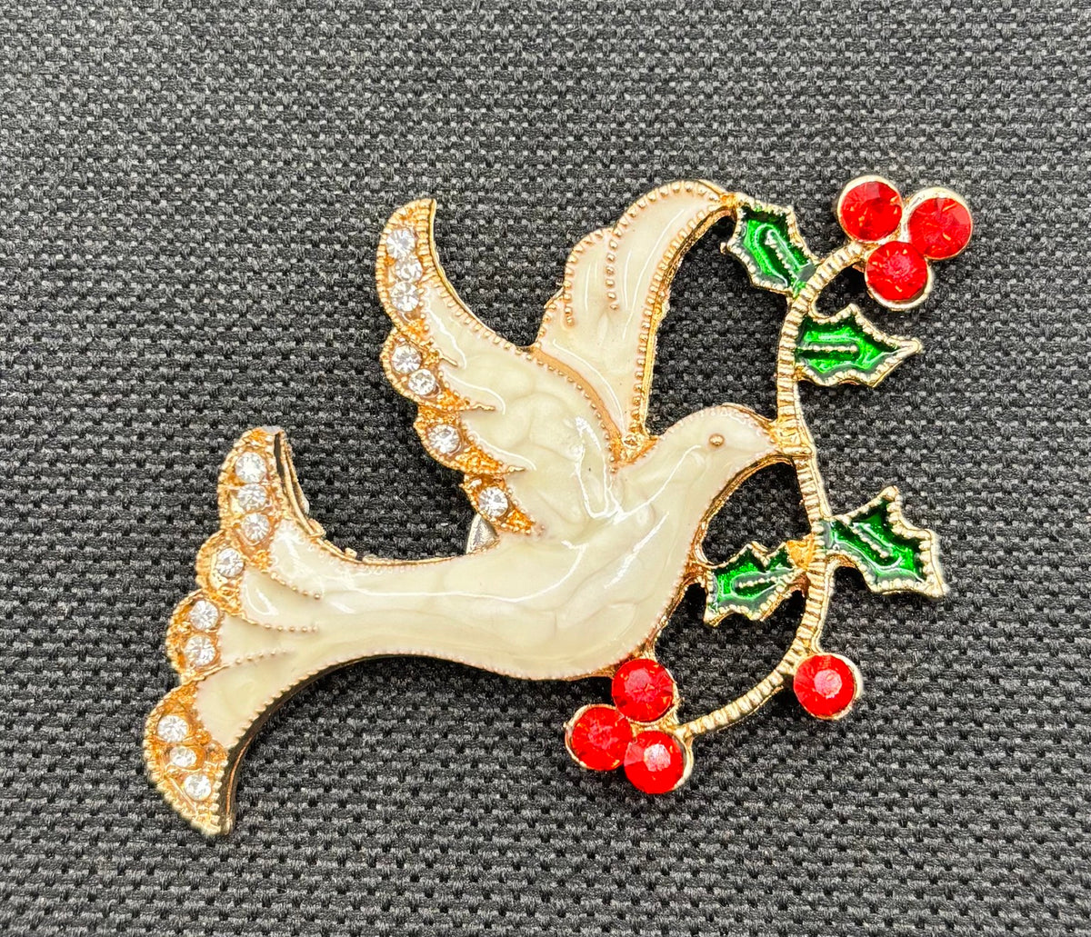 Enamel dove with red crystal branch needle minder — dark fabric