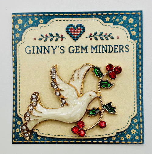 Enamel dove with red crystal branch needle minder on Ginny's Gem Minders display card